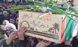 رنگ و عطر دوران دفاع مقدس بازهم در آسمان منطقه گوگان پراکنده شد/عطر خوش شهید گمنام شهر تیمورلو را معطر کرد